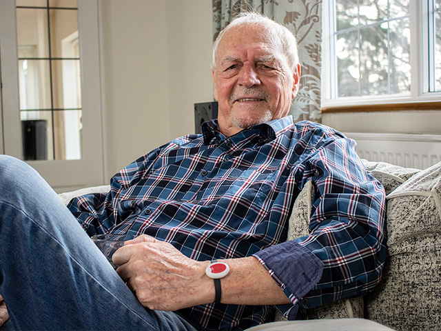 Man wearing his MyAmie pendant